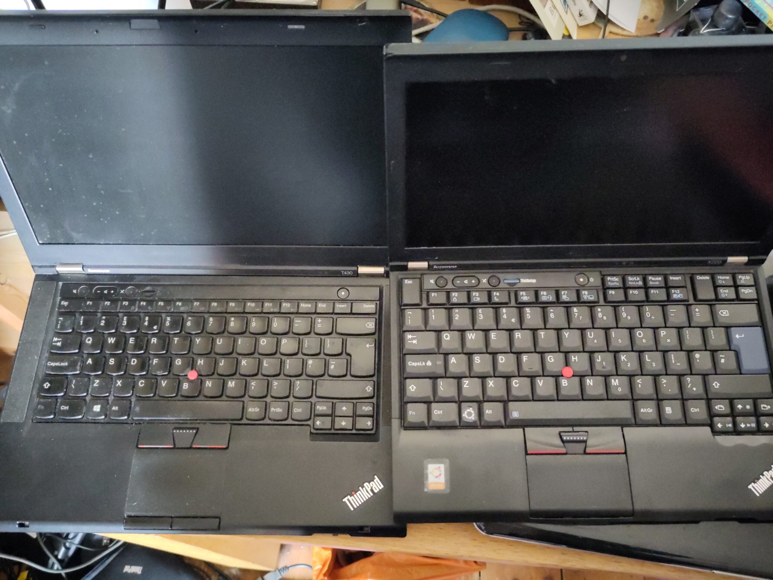 Two open laptops, side-by-side.